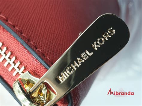 como distinguir un bolso michael kors original|cartera michael kors original.